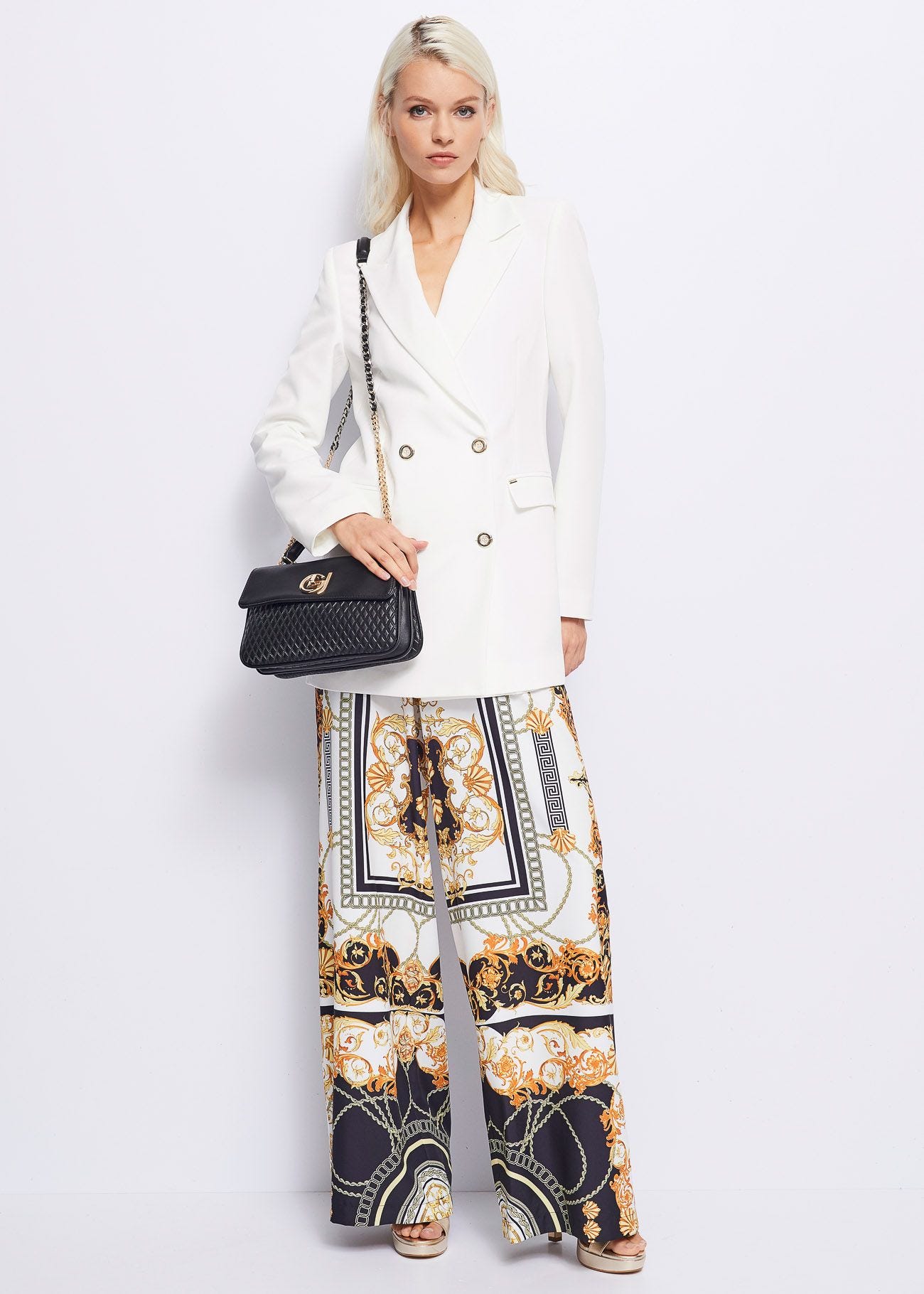 Trousers in printed crepe de chine